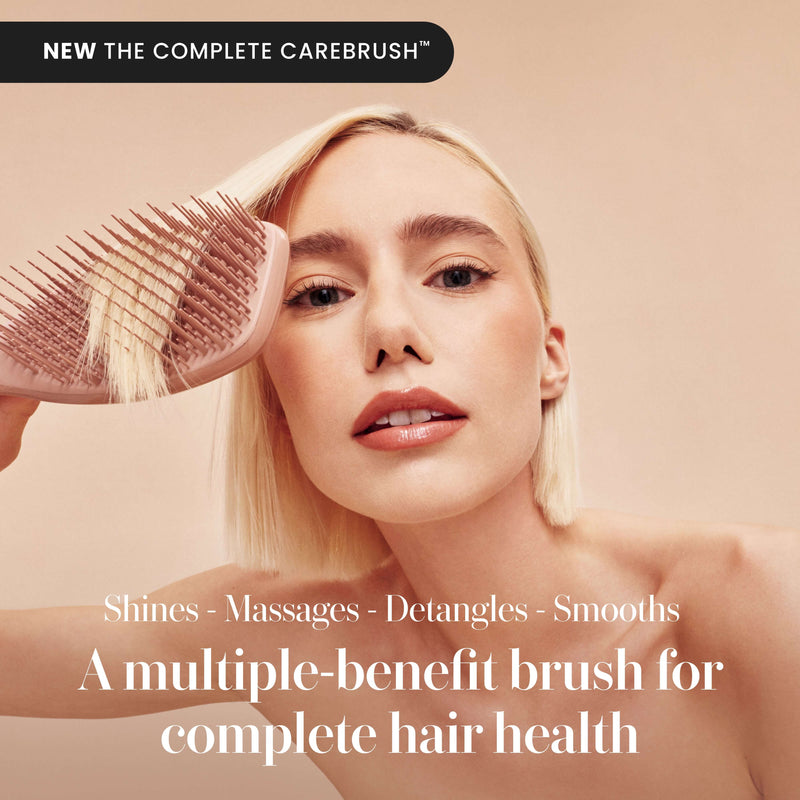 Model using the Tangle Teezer Complete Carebrush in Glazed Mocha