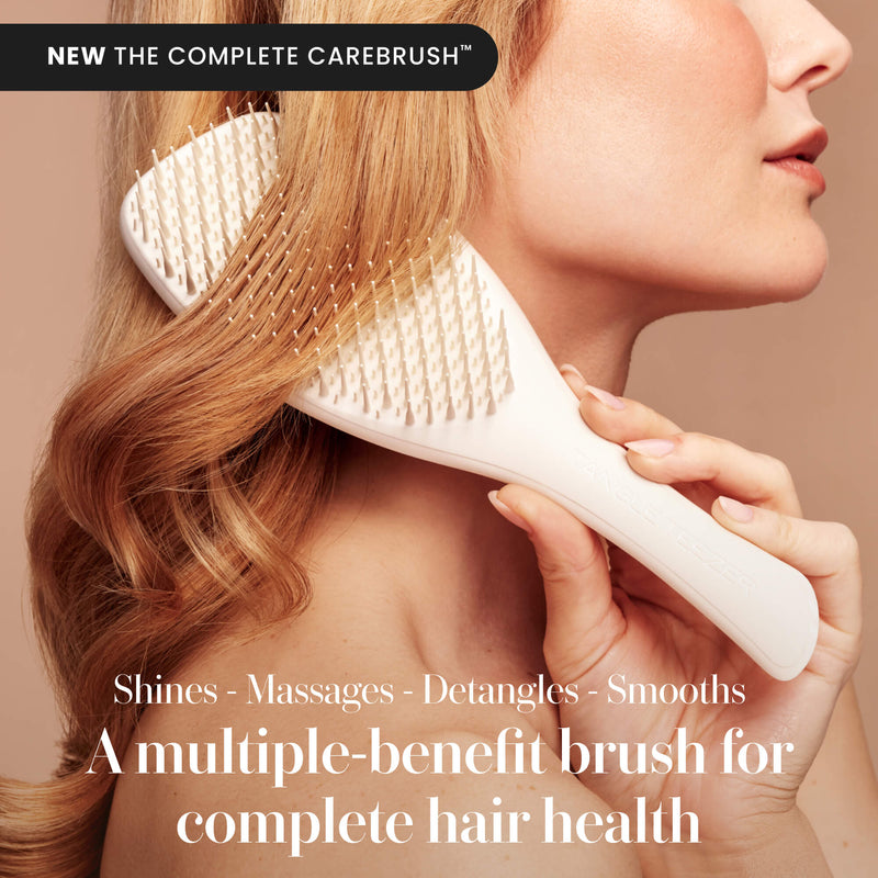 Model using the Tangle Teezer Complete Carebrush in Halo White