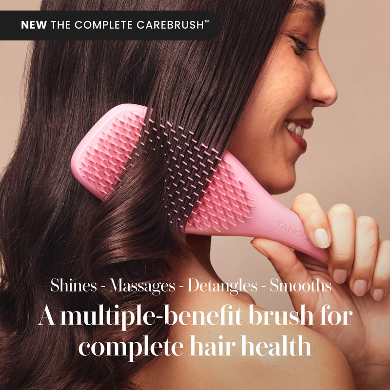 Model using the Tangle Teezer Complete Carebrush in Satin Rose